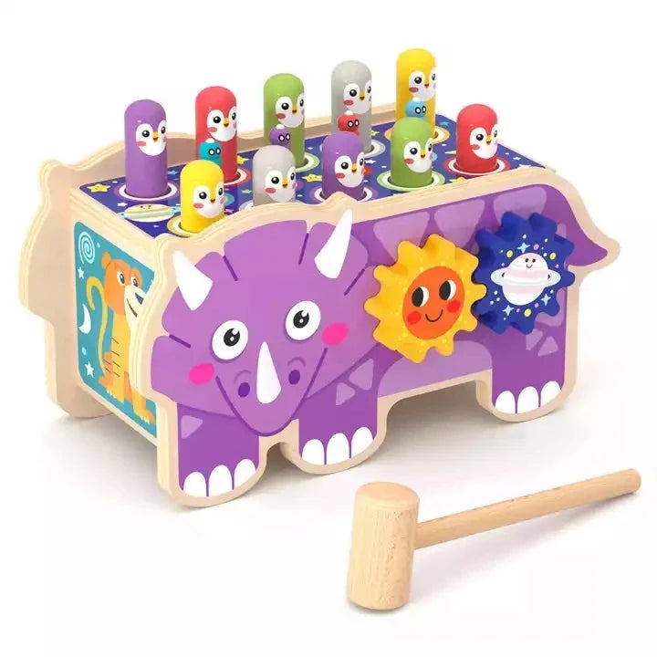 Banc à marteler en bois : le tricératops violet, ses chevilles pingouins et le maillet