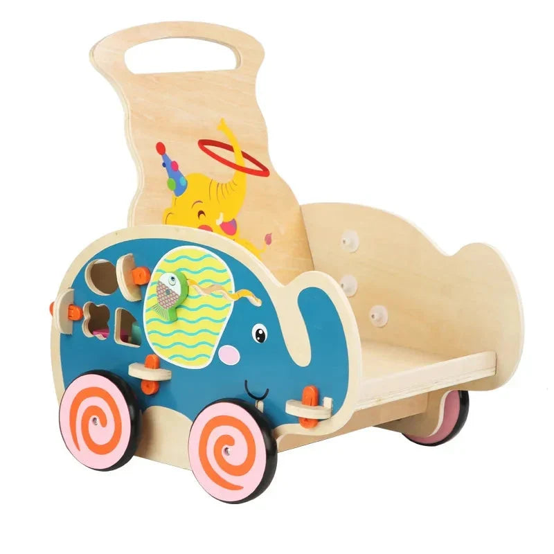 Chariot de marche éléphant en bois, de trois quarts : la poignée, le panneau de jeux et le bac
